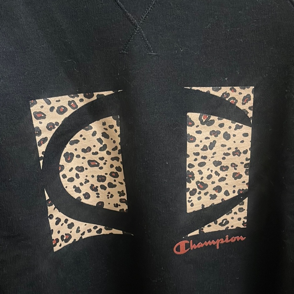 Black champion sweater with cheetah print large